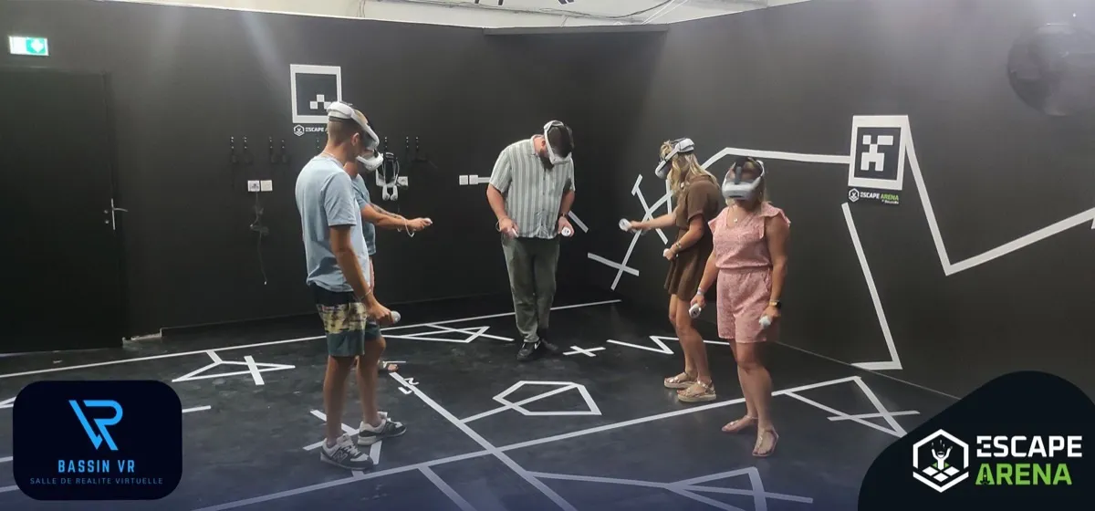 Players wearing headsets in the small VR arena